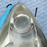 ヘッドライト黄ばみ除去前のスバルＲ１のヘッドライト